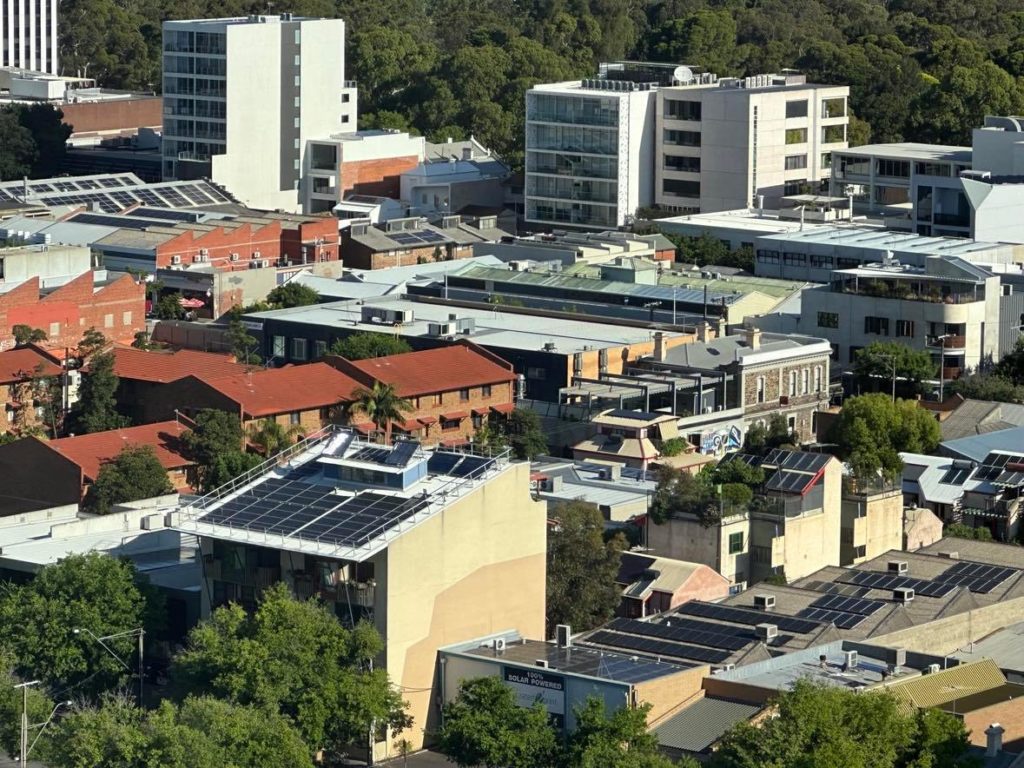 Christie Walk, the home of Adelaide Chronicles, can be seen with an abundance of solar panels and trees.